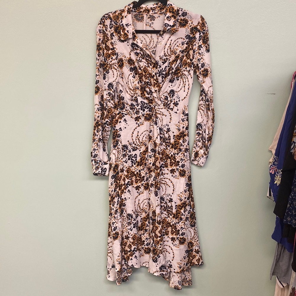 Free People Print dress. White, black & camel color. Button front. Size 10.
